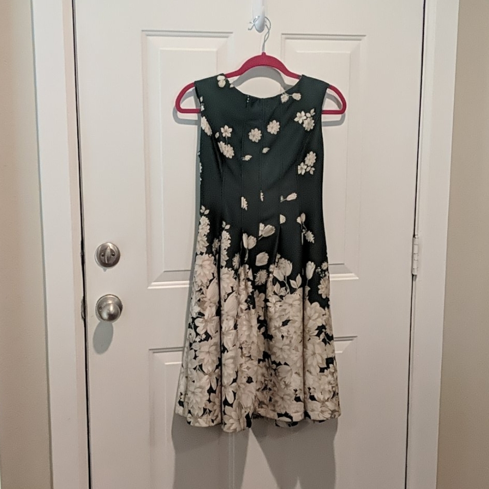 Dark green dress with flowers and pockets